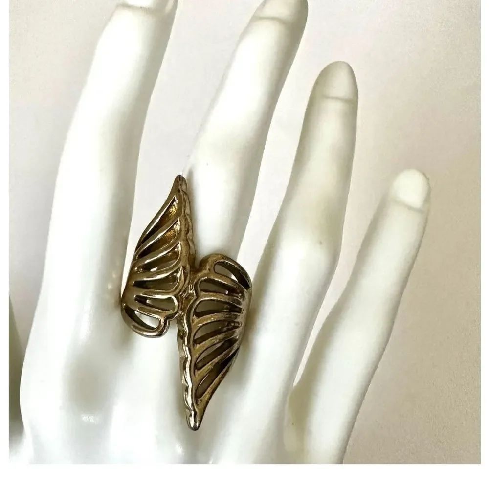 Gold tone angel wings cocktail ring